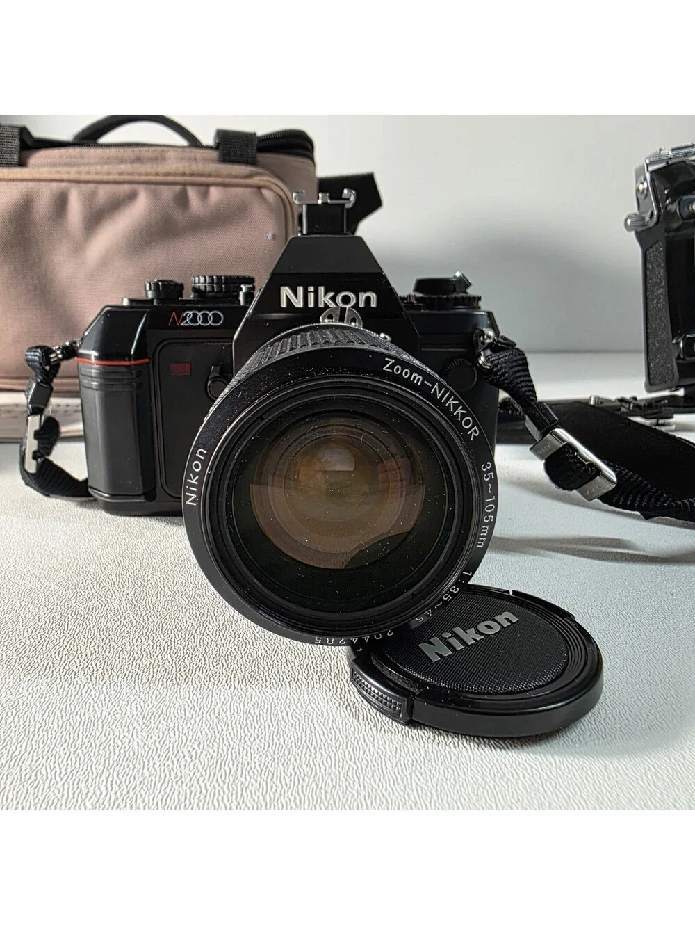 Nikon N2000 35mm Film Camera w/ Nikon Nikkor 35-105mm f3.5-4.5 Zoom Lens Bundle